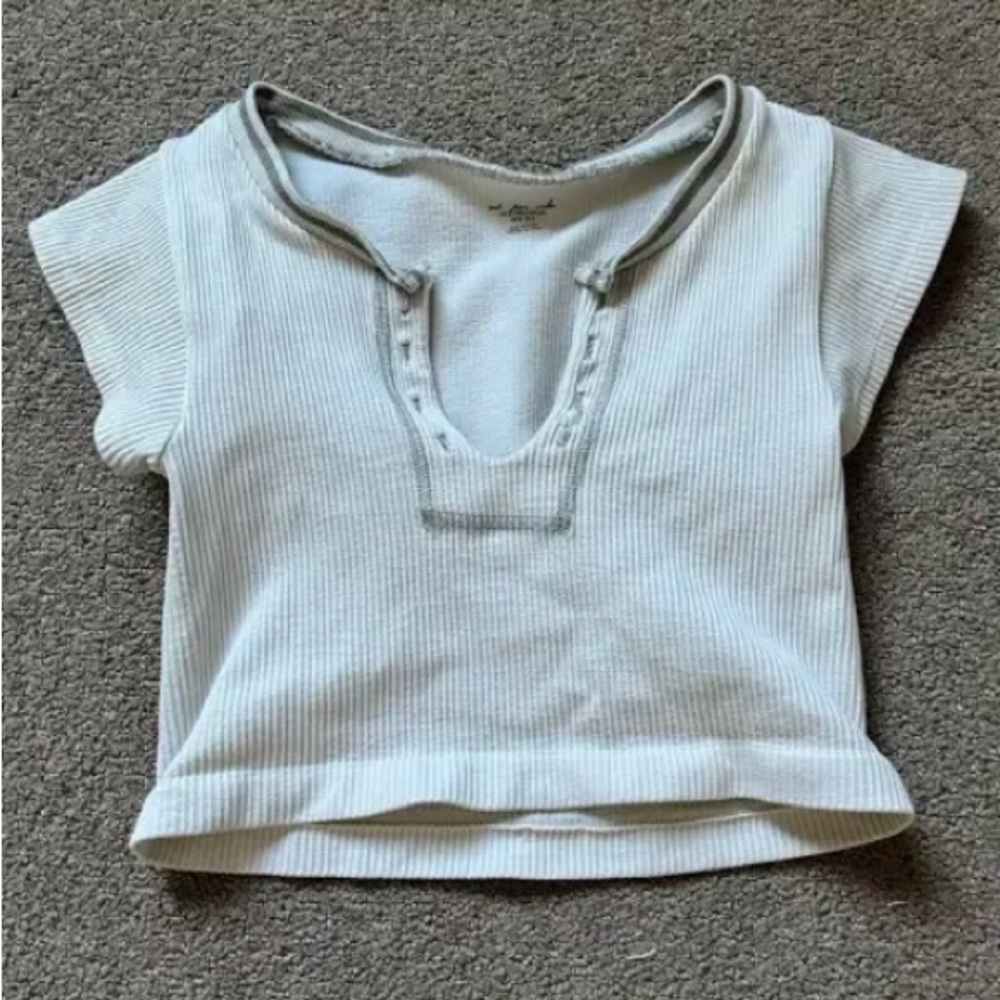 Urban Outfitters go for gold top in white